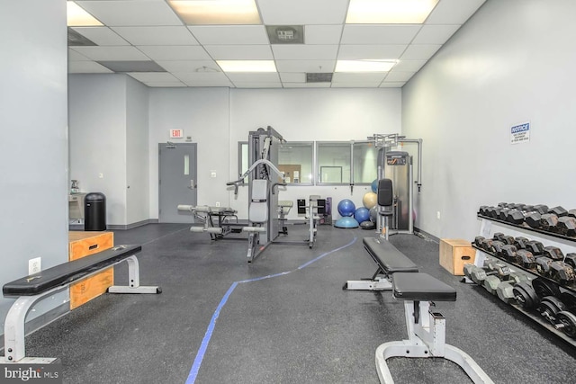 1308 Clifton St NW Unit 118, Washington, DC 20009 - workout area featuring a paneled ceiling and a high ceiling