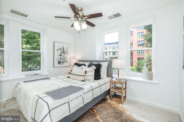 1308 Clifton St NW Unit 118, Washington, DC 20009 - carpeted bedroom featuring baseboards and a ceiling fan