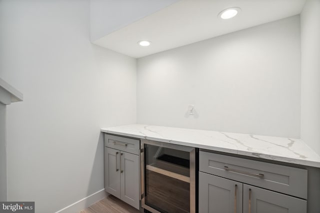 1448 N Myrtlewood St, Philadelphia, PA 19121 - bar area featuring beverage cooler, wood finished floors, and recessed lighting