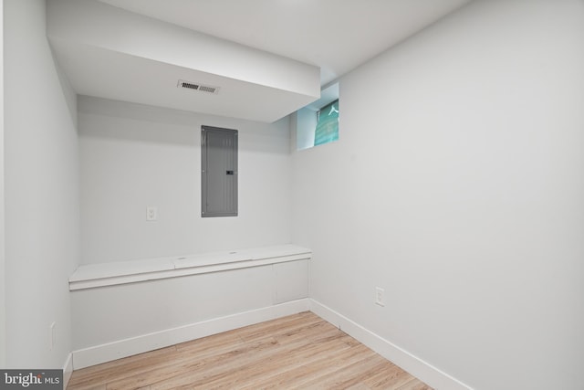 1448 N Myrtlewood St, Philadelphia, PA 19121 - empty room featuring electric panel and wood finished floors