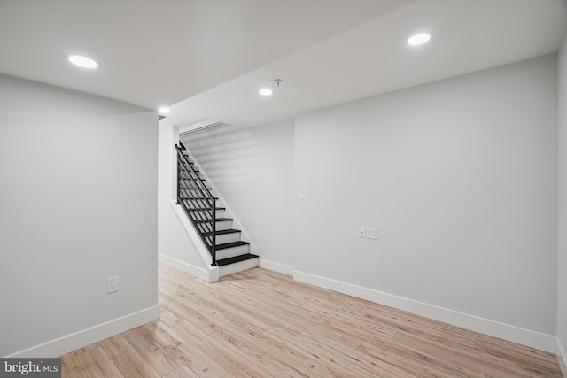 1448 N Myrtlewood St, Philadelphia, PA 19121 - finished basement featuring wood finished floors, stairs, and recessed lighting