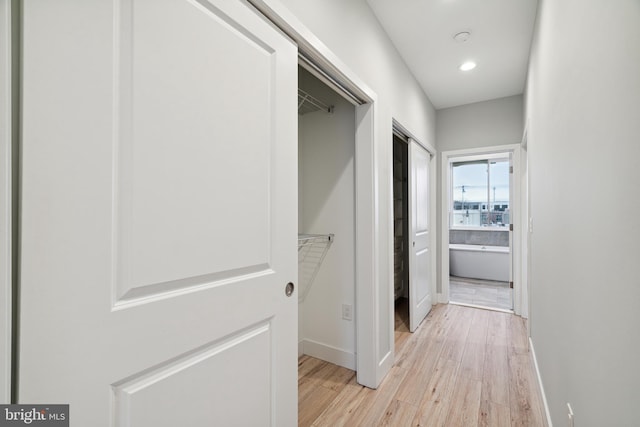 1448 N Myrtlewood St, Philadelphia, PA 19121 - hallway with light wood-style floors and baseboards