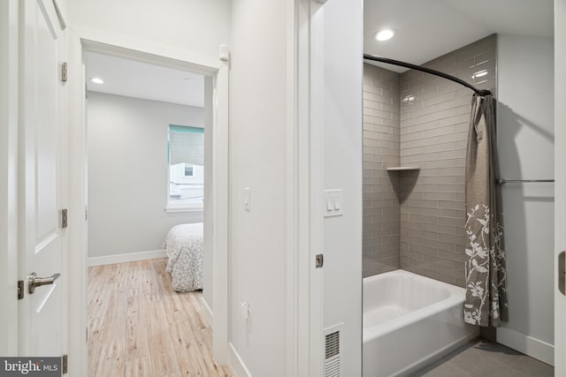 1448 N Myrtlewood St, Philadelphia, PA 19121 - full bath with shower / tub combo with curtain, recessed lighting, wood finished floors, and ensuite bath