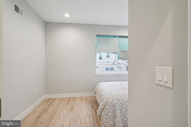 1448 N Myrtlewood St, Philadelphia, PA 19121 - bedroom with wood finished floors and recessed lighting
