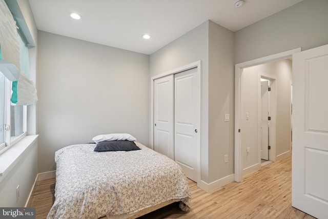 1448 N Myrtlewood St, Philadelphia, PA 19121 - bedroom featuring light wood-style flooring, a closet, and recessed lighting