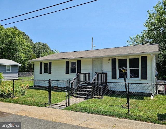 310 Franklin St, Colonial Beach, VA 22443 - view of front facade featuring a fenced front yard and a gate