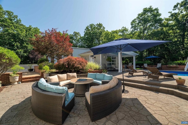 2865 Proffit Rd, Charlottesville, VA 22911 - view of patio with an outdoor living space with a fire pit and an outbuilding