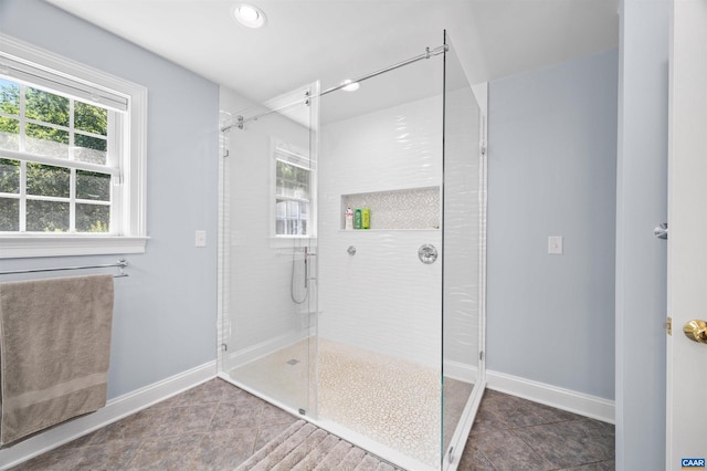 2865 Proffit Rd, Charlottesville, VA 22911 - bathroom with tile patterned flooring, a shower stall, plenty of natural light, and recessed lighting