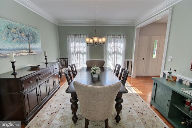 8011 Lions Crest Way, Gaithersburg, MD 20879 - dining room with a chandelier, plenty of natural light, crown molding, and light wood finished floors