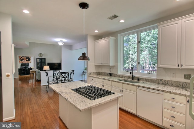 8011 Lions Crest Way, Gaithersburg, MD 20879 - kitchen with dishwasher, black gas stovetop, white cabinetry, backsplash, and recessed lighting