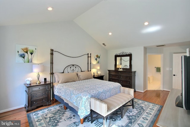 8011 Lions Crest Way, Gaithersburg, MD 20879 - bedroom with vaulted ceiling, wood finished floors, and recessed lighting