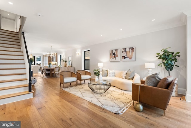 1720 15th St NW, Washington, DC 20009 - living area featuring stairway, light wood-type flooring, a chandelier, ornamental molding, and recessed lighting