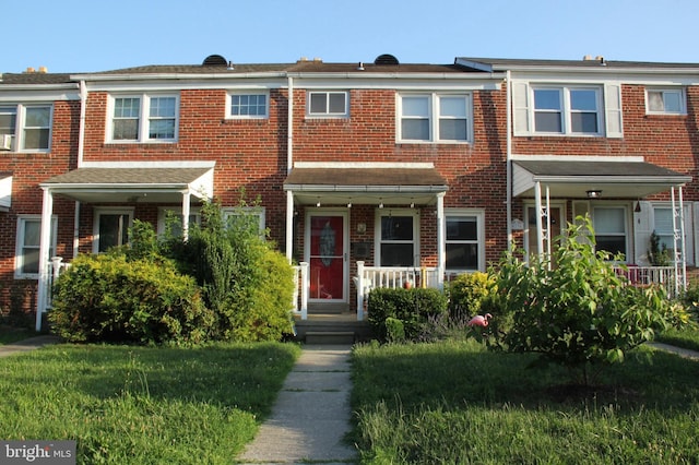 4234 Elsa Ter, Baltimore, MD 21211 - townhome / multi-family property featuring brick siding