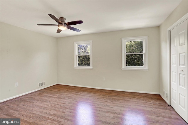 38 Fairfax Vlg, Harrisburg, PA 17112 - unfurnished bedroom with wood finished floors, a closet, and ceiling fan