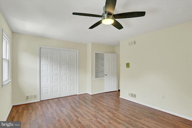 38 Fairfax Vlg, Harrisburg, PA 17112 - unfurnished bedroom with wood finished floors, a closet, and ceiling fan