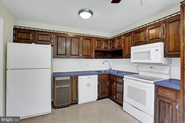 38 Fairfax Vlg, Harrisburg, PA 17112 - kitchen featuring white appliances, dark countertops, and light flooring
