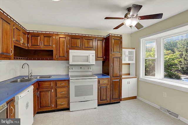 38 Fairfax Vlg, Harrisburg, PA 17112 - kitchen featuring white appliances, ceiling fan, and brown cabinets