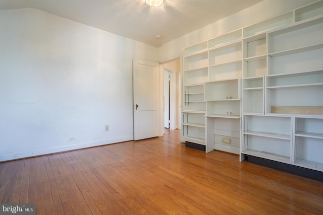 6339 Frederick Rd, Baltimore, MD 21228 - unfurnished room with wood-type flooring and baseboards