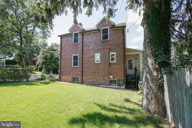 6339 Frederick Rd, Baltimore, MD 21228 - back of house featuring brick siding and entry steps