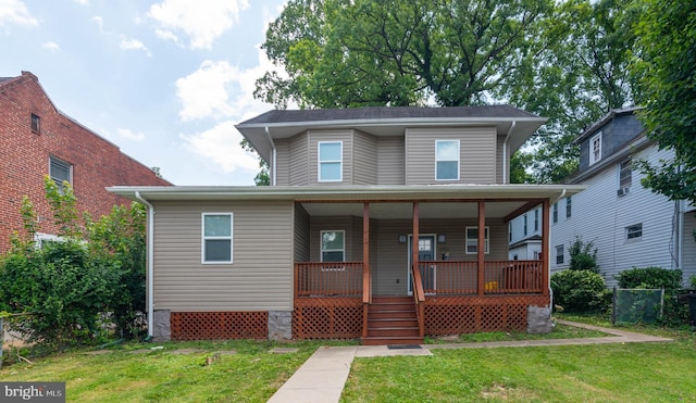 3923 Fairview Ave, Baltimore, MD 21216 - view of front facade featuring a front yard and a porch
