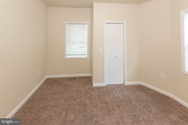 3923 Fairview Ave, Baltimore, MD 21216 - unfurnished bedroom with carpet floors and a closet
