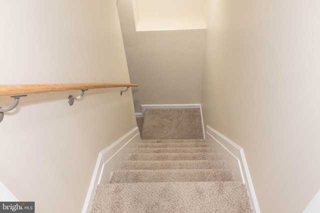 3923 Fairview Ave, Baltimore, MD 21216 - staircase with baseboards and carpet