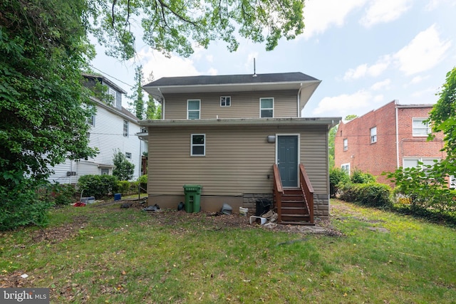 3923 Fairview Ave, Baltimore, MD 21216 - back of property with entry steps and a lawn