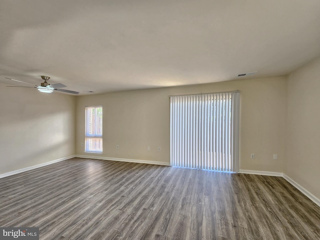 8688 Village Sq, Alexandria, VA 22309 - unfurnished room featuring dark wood finished floors and ceiling fan