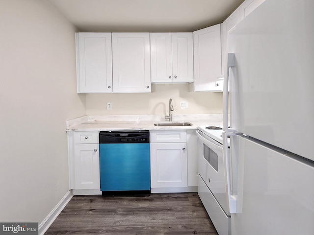 8688 Village Sq, Alexandria, VA 22309 - kitchen featuring white appliances, dark wood finished floors, white cabinets, and light countertops