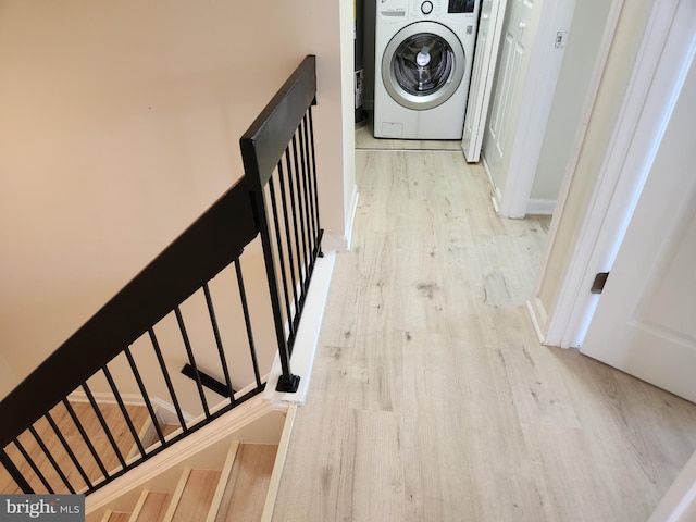 8688 Village Sq, Alexandria, VA 22309 - laundry area with washer / dryer and wood finished floors