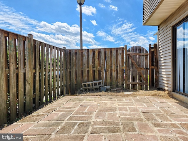 8688 Village Sq, Alexandria, VA 22309 - view of patio with a gate