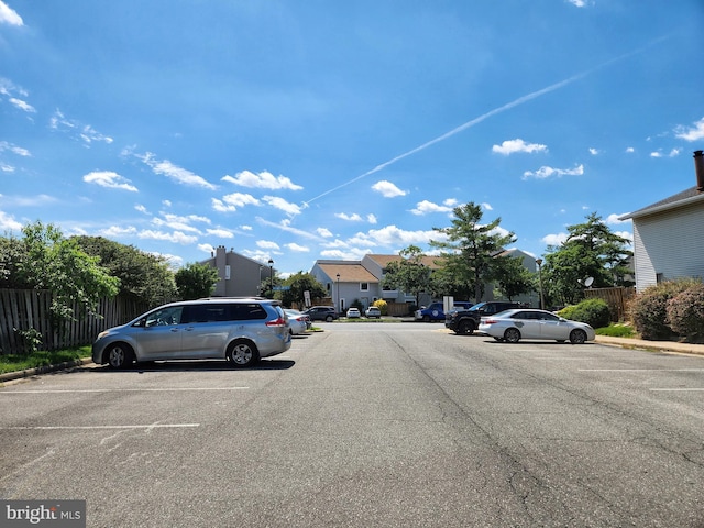 8688 Village Sq, Alexandria, VA 22309 - view of asphalt road featuring curbs and a residential view