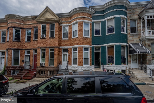 2812 Auchentoroly Ter, Baltimore, MD 21217 - multi unit property featuring entry steps, brick siding, and cooling unit