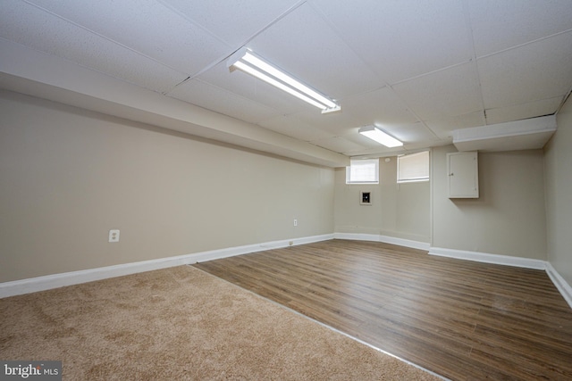 2812 Auchentoroly Ter, Baltimore, MD 21217 - basement featuring baseboards and dark wood-style flooring