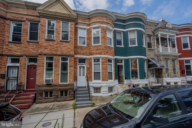 2812 Auchentoroly Ter, Baltimore, MD 21217 - multi unit property featuring entry steps, brick siding, and cooling unit