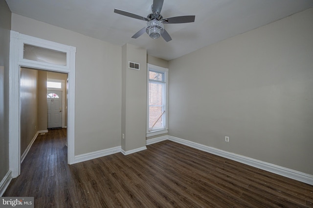 2812 Auchentoroly Ter, Baltimore, MD 21217 - spare room featuring dark wood-style flooring and ceiling fan
