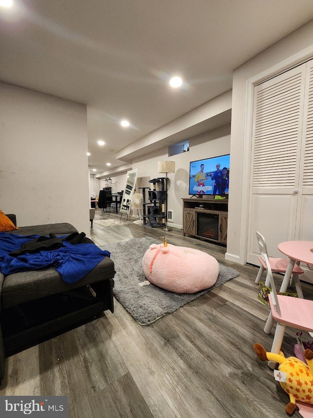7034 N Broad St, Philadelphia, PA 19126 - living room with wood finished floors, recessed lighting, and a fireplace