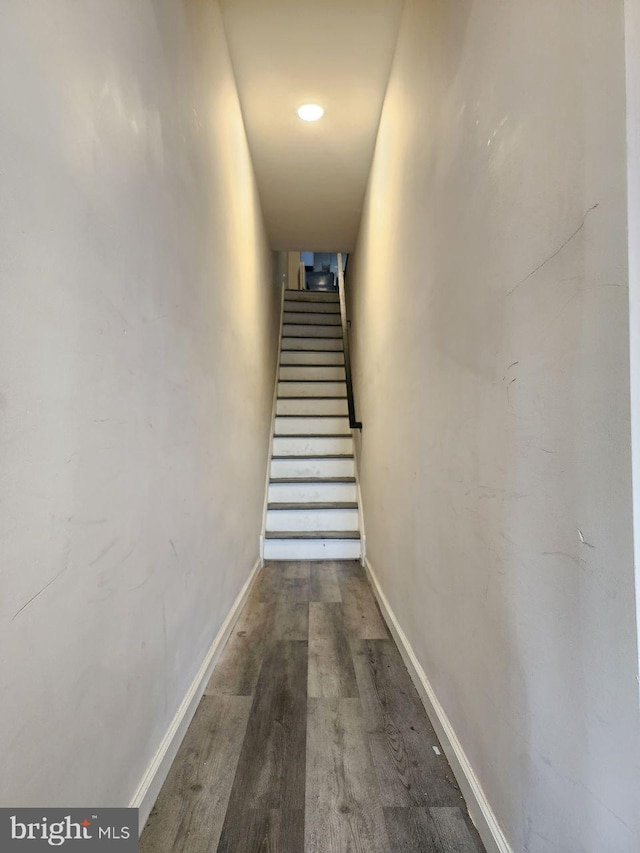 7034 N Broad St, Philadelphia, PA 19126 - corridor with dark wood-style flooring and stairs