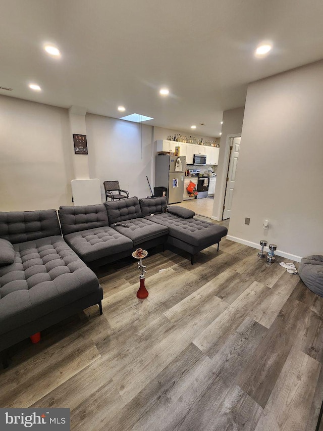 7034 N Broad St, Philadelphia, PA 19126 - living room with wood finished floors and recessed lighting