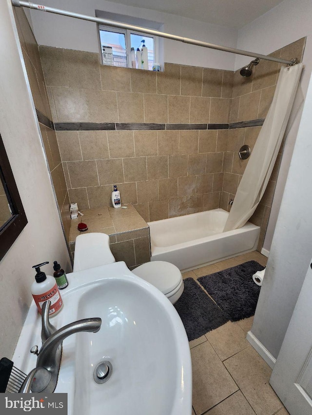 7034 N Broad St, Philadelphia, PA 19126 - bathroom with shower / bath combo and tile patterned flooring