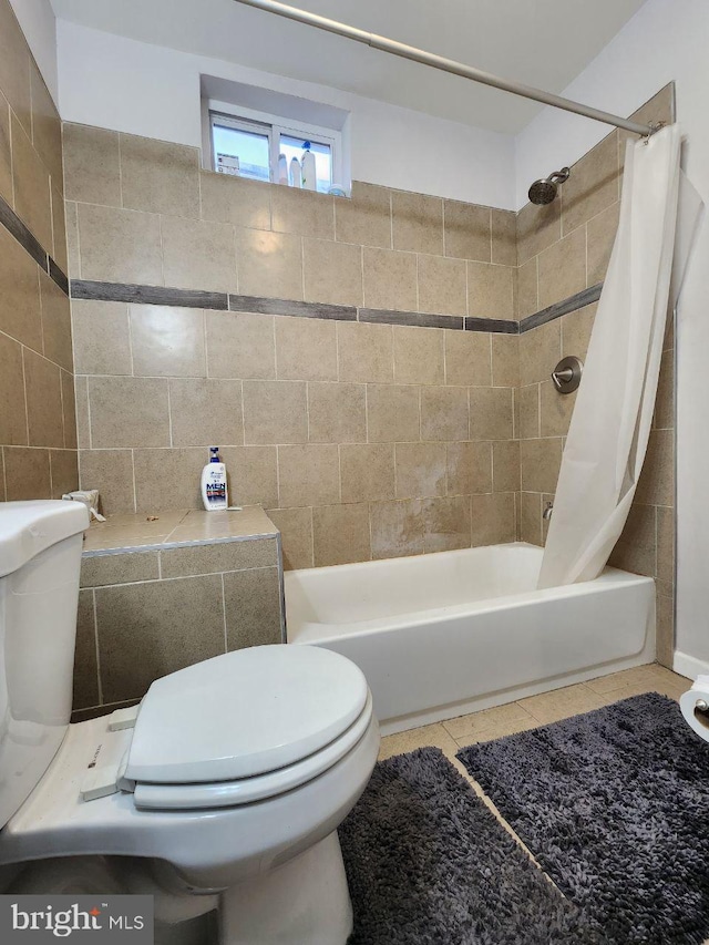 7034 N Broad St, Philadelphia, PA 19126 - bathroom featuring shower / bath combo with shower curtain and tile patterned flooring