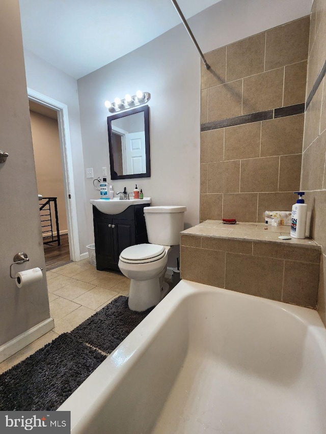 7034 N Broad St, Philadelphia, PA 19126 - full bath with vanity, a tub, and tile patterned flooring