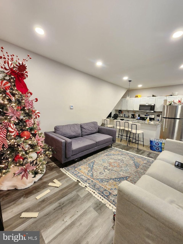 7034 N Broad St, Philadelphia, PA 19126 - living area with light wood-style floors and recessed lighting
