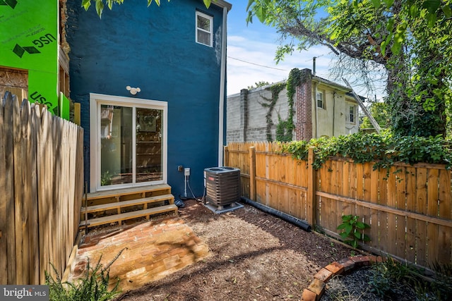 1406 Lemmon St, Baltimore, MD 21223 - view of side of home with entry steps and stucco siding