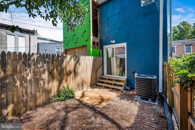 1406 Lemmon St, Baltimore, MD 21223 - back of property with entry steps and stucco siding
