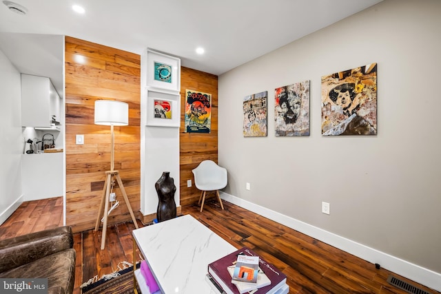 1406 Lemmon St, Baltimore, MD 21223 - sitting room with recessed lighting, wood walls, and hardwood / wood-style floors