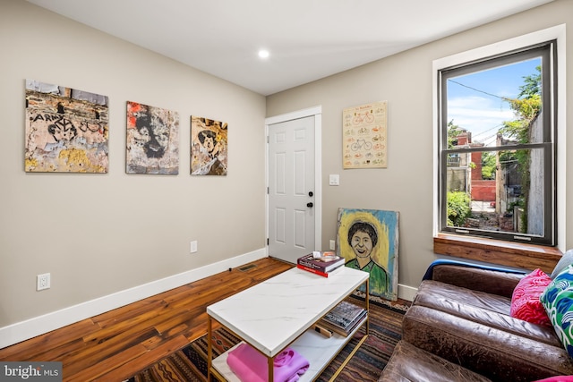 1406 Lemmon St, Baltimore, MD 21223 - living area with dark wood-style flooring and recessed lighting