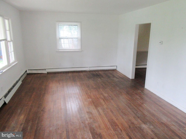 1267 Ringing Rocks Park, Pottstown, PA 19464 - empty room featuring wood finished floors, a baseboard heating unit, and a baseboard radiator