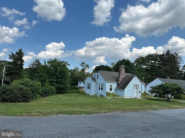 148 N Arlington Ave, Harrisburg, PA 17109 - view of side of home featuring a chimney and a yard