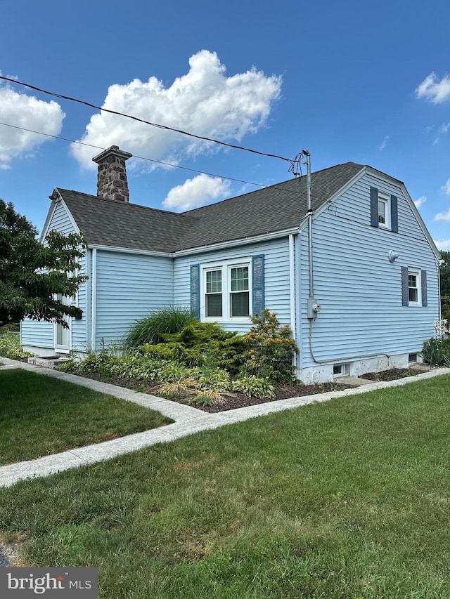 148 N Arlington Ave, Harrisburg, PA 17109 - view of side of property with a lawn, a chimney, and a shingled roof